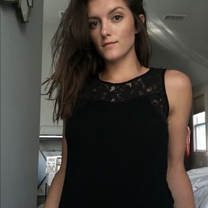 Black sleeveless blouse